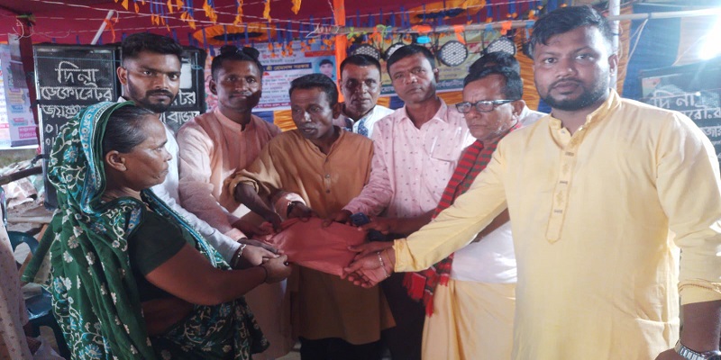 ধর্মপাশায় শারদীয় দূর্গা উৎসবে পূজা  উদযাপন  ফ্রন্টের বস্ত্র ও বৃক্ষ বিতরণ
